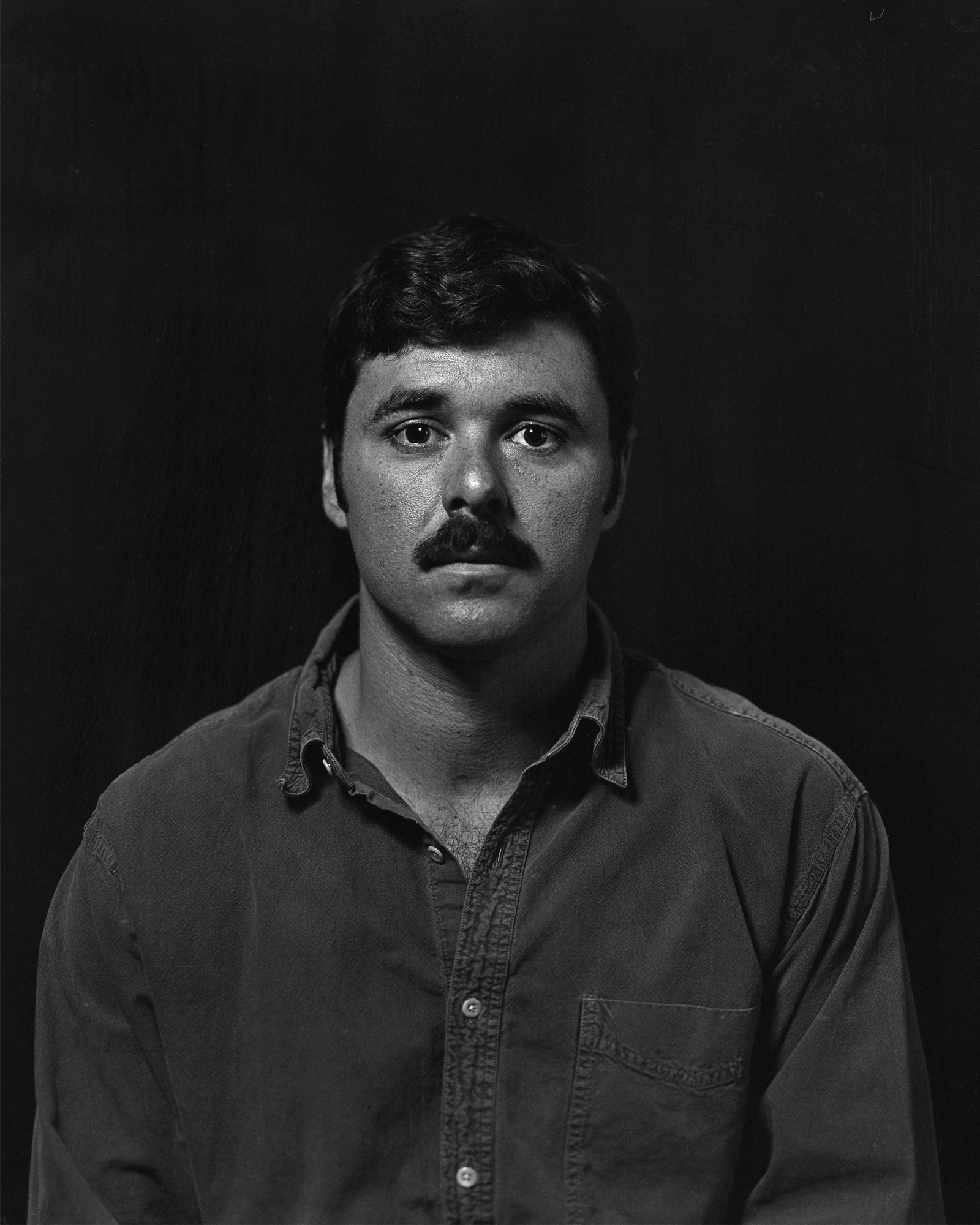 Black-and-white self portrait of Dante D'Ignazio.